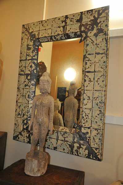 Appraisal: A RUSTIC TIN EMBOSSED WALL MIRROR