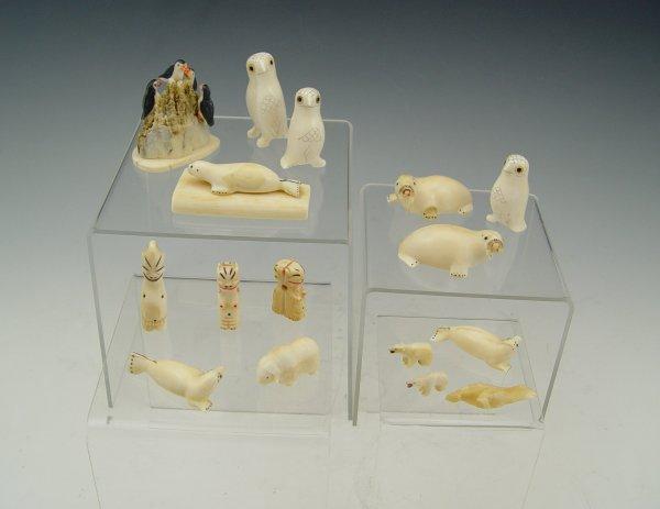 Appraisal: COLLECTION OF ALASKAN INUIT IVORY FIGURES Carved figures most appear