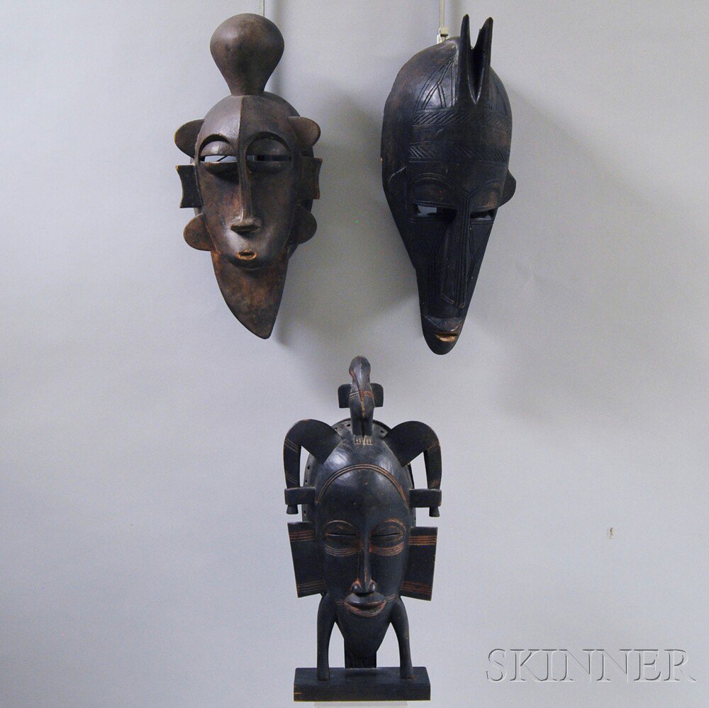 Appraisal: Three Carved African Masks including a Bambara mask ht to