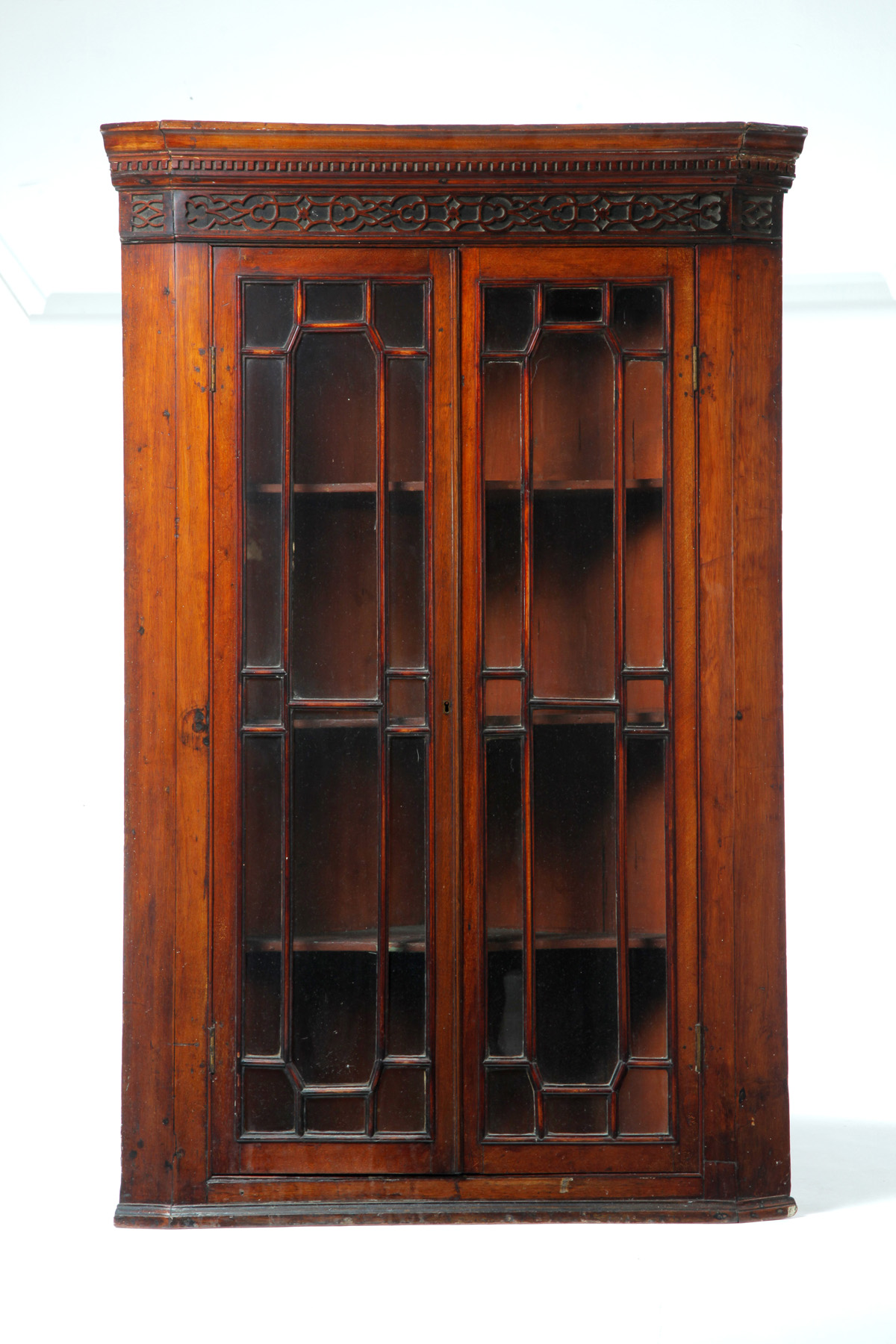 Appraisal: ENGLISH REGENCY HANGING CORNER CUPBOARD Nineteenth century mahogany and pine