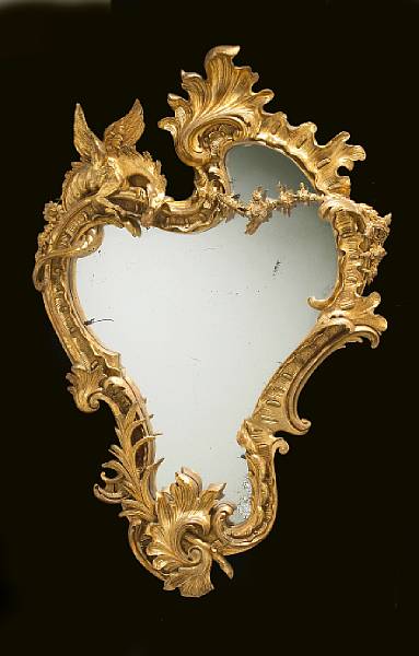 Appraisal: A Continental Rococo style gitwood and gilt composition mirror late