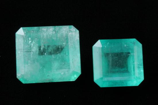 Appraisal: TWO UNMOUNTED EMERALD-CUT EMERALDS One emerald measures approx mm x