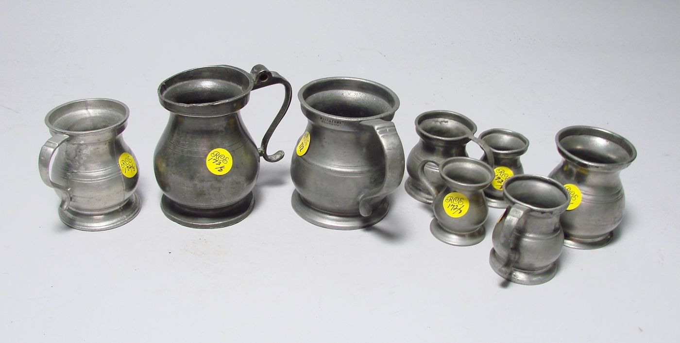 Appraisal: EIGHT ENGLISH BALUSTER-FORM PEWTER MEASURES th CenturyIn varying heights Not