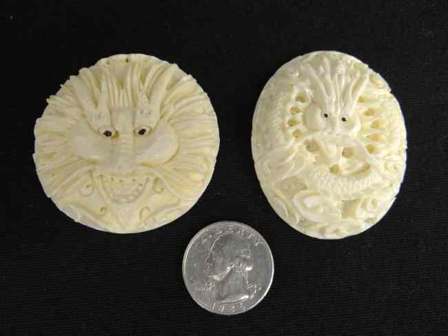 Appraisal: Pair Asian carved ivory pendants