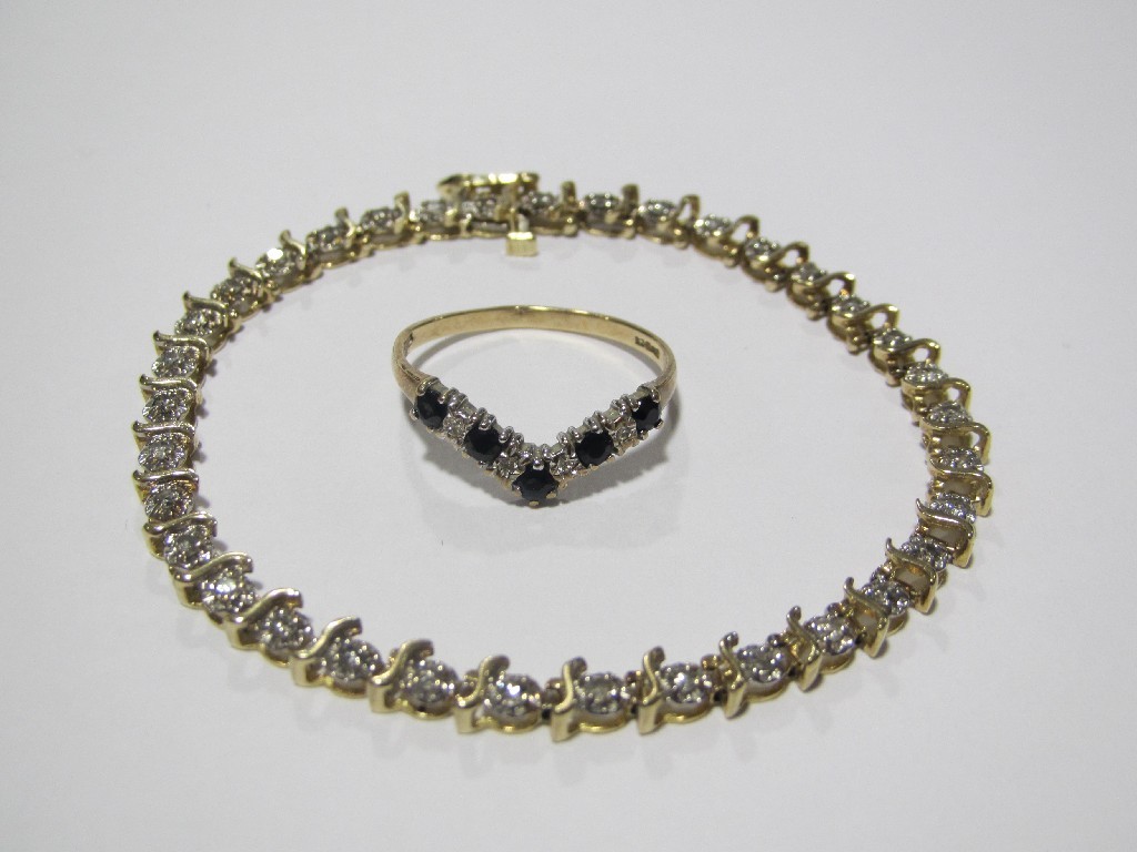 Appraisal: Lot comprising a ct gold diamond line bracelet and a