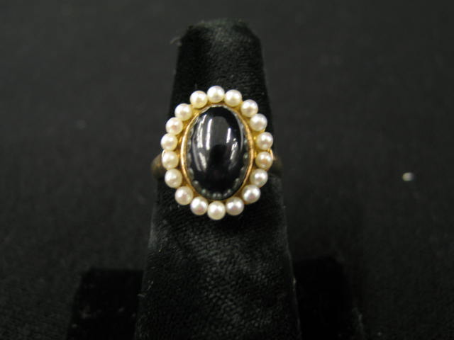 Appraisal: Blue Sapphire Pearl Ring carat deep blue oval cabochon surrounded