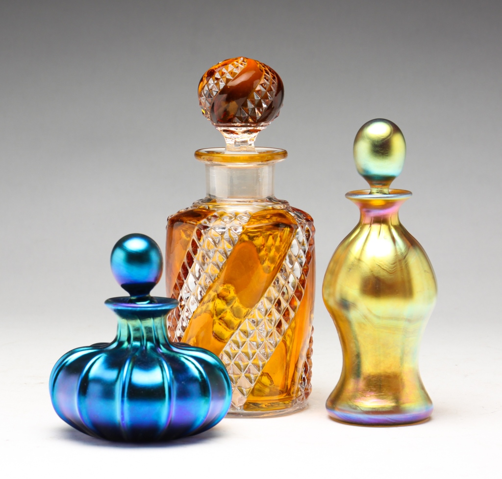 Appraisal: THREE PERFUME BOTTLES European th century Baccarat Serpentine perfume h