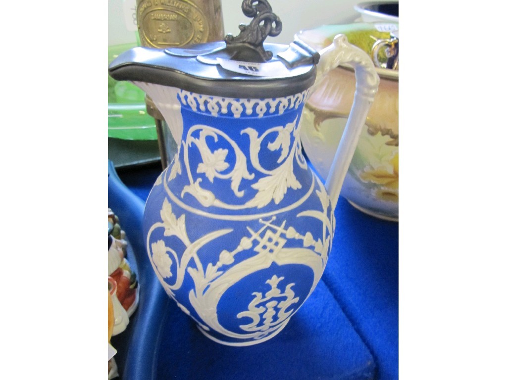 Appraisal: Victorian pewter topped jug with foliate decoration