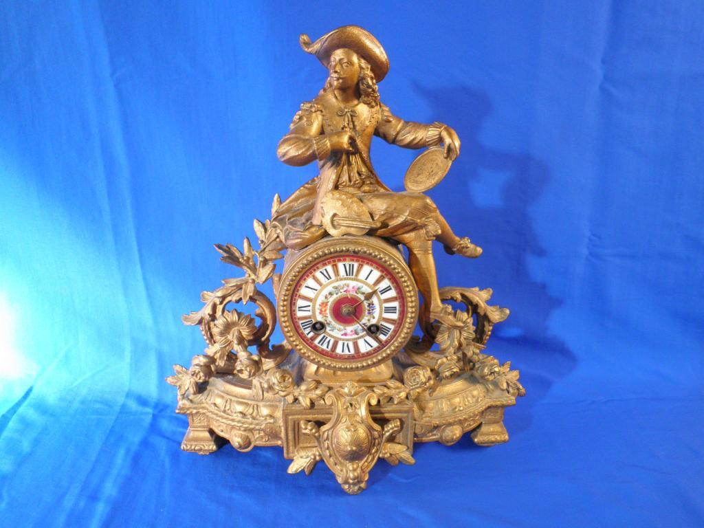 Appraisal: A French gilt metal mantel clock the case cast in