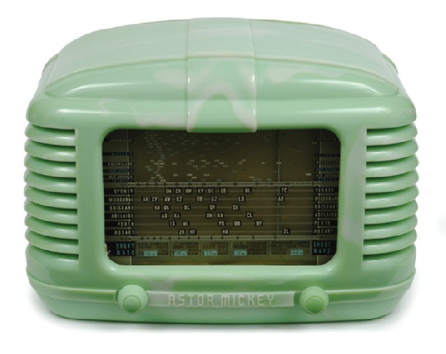 Appraisal: Astor Mickey circa green case with clouds louvered sides and