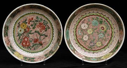 Appraisal: TWO SIMILAR CHINESE FAMILLE VERTE DISHES Each with floral blooms