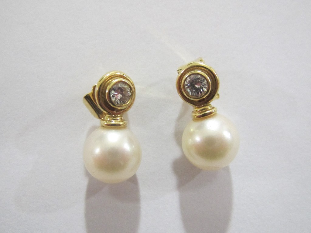 Appraisal: Cultured pearl drop earrings with ct gold collett set diamond