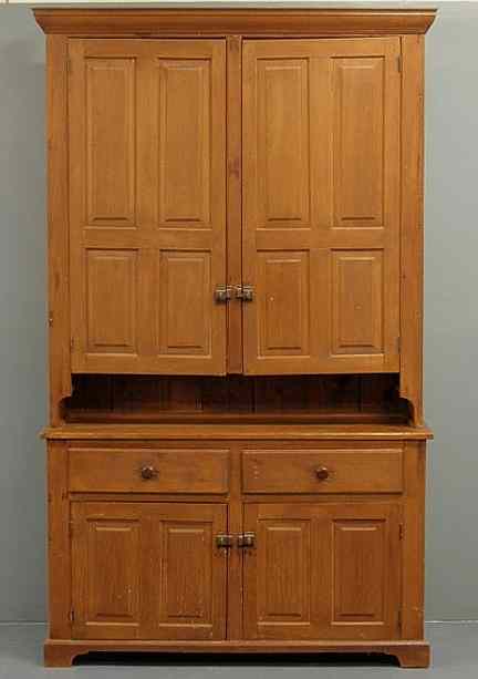 Appraisal: Pine two-piece Dutch cupboard comprised of some period elements h