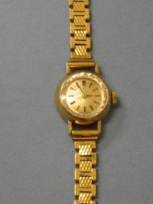 Appraisal: A CT GOLD OMEGA LADY'S WATCH the winding movement having