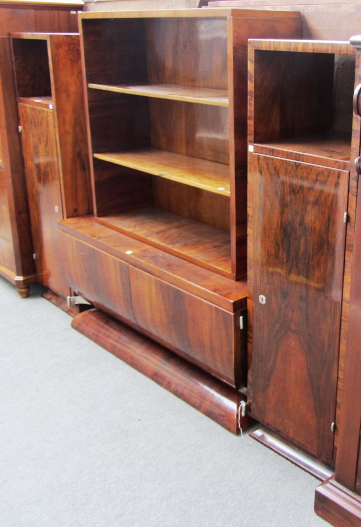 Appraisal: A Hungarian Art Deco walnut side cabinet with two tier