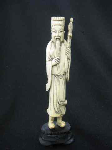 Appraisal: Chinese Carved Ivory Figurine of a Bearded Manholding a sword