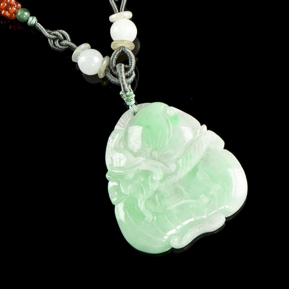 Appraisal: A NATURAL CARVED JADE PENDANT NECKLACE A NATURAL CARVED JADE