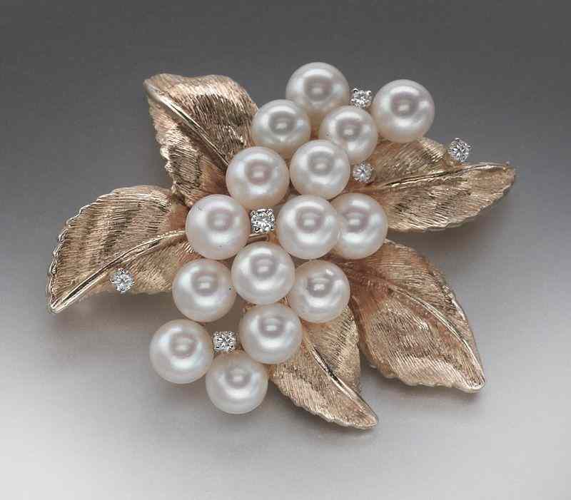 Appraisal: Retro K gold diamond and pearl broochfeaturing Akoya pearls -