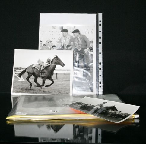 Appraisal: Various sports related photographs including wood cutting horseracing car racing