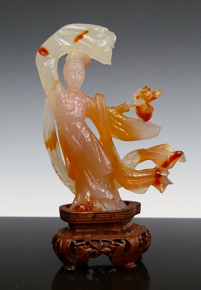 Appraisal: CHINESE CARNELIAN AGATE QUAN YIN SCULPTURE Chinese carved carnelian agate