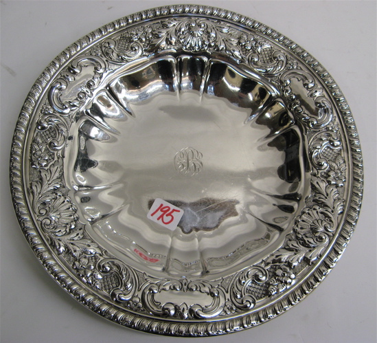 Appraisal: A ROUND WALLACE STERLING SILVER SERVING DISH ornately decorated hand