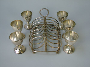 Appraisal: A set of six George III silver egg cups London