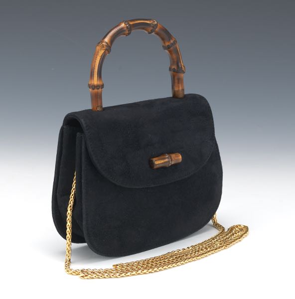 Appraisal: GUCCI BLACK SUEDE EVENING BAG x x Elegant suede body