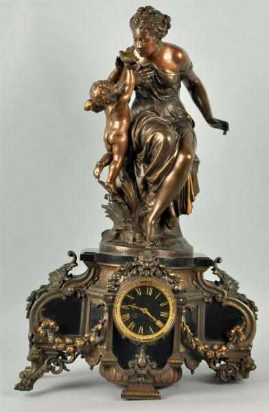 Appraisal: Bronze Time Strike Clock Description Shows a woman being fed