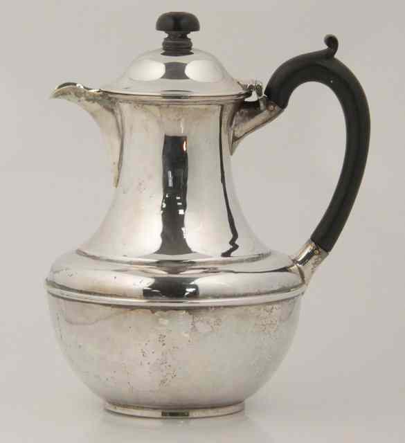 Appraisal: A silver water jug Alstons' Hallam London of urn form