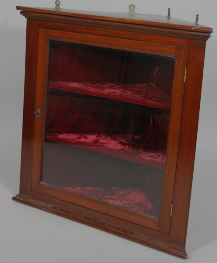 Appraisal: An early thC mahogany hanging corner cupboard the rectangular moulded