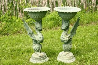 Appraisal: PAIR OF GRYPHON BASED METAL PLANTERS th c Aluminum in