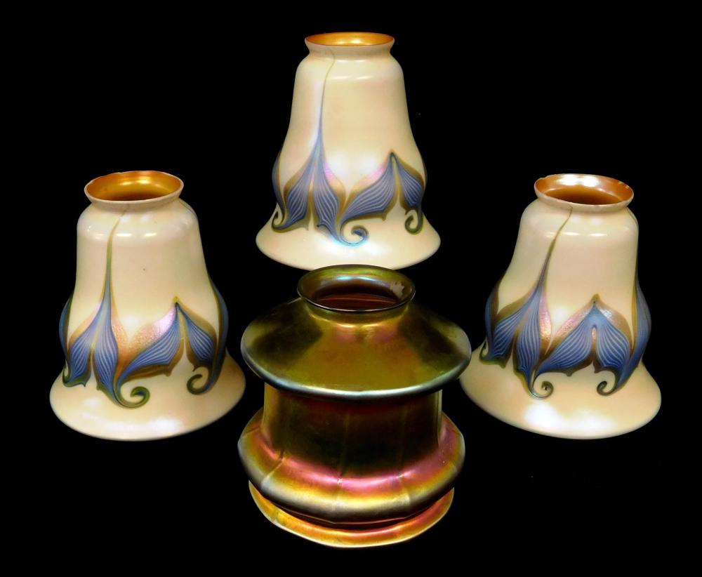 Appraisal: ART GLASS Four iridescent art glass shades American early th