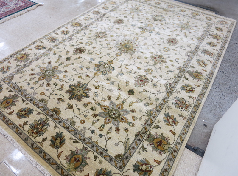 Appraisal: HAND KNOTTED ORIENTAL CARPET Indo-Persian Isfahan design of floral tracery