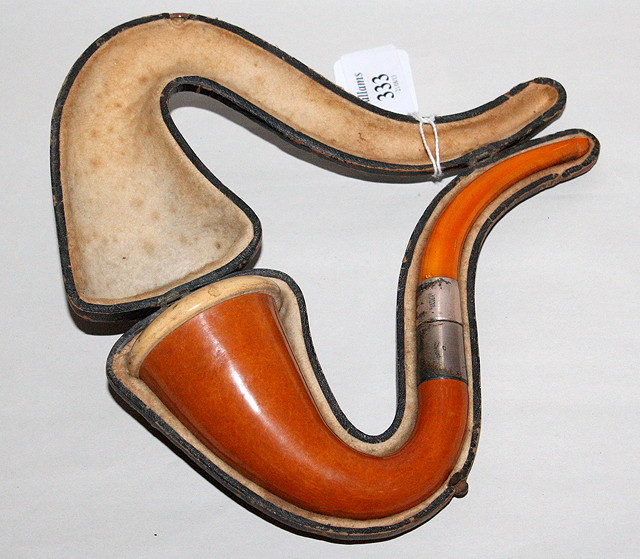 Appraisal: A MEERSCHAUM AND AMBER SMOKERS PIPE with silver mounts and