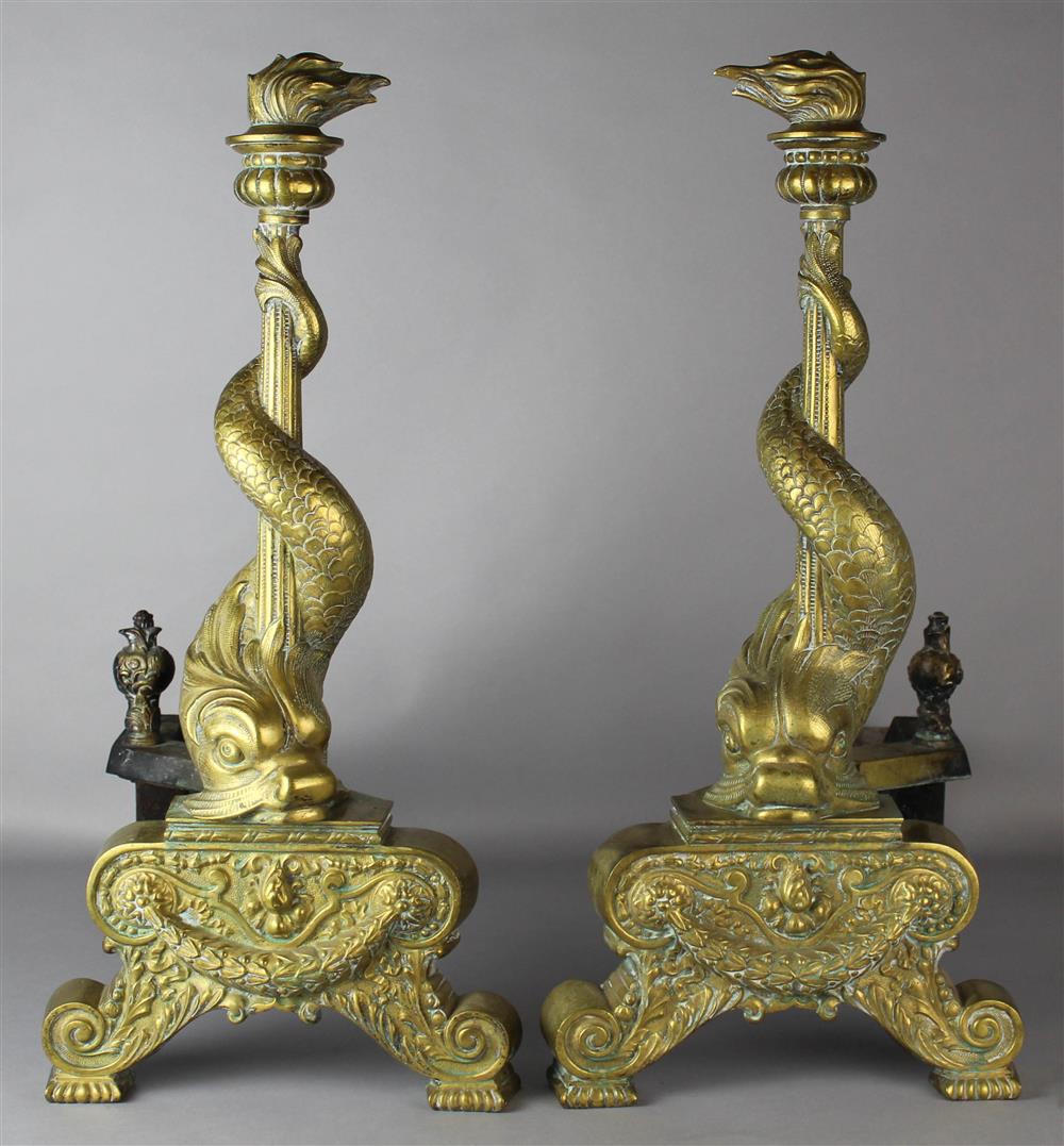 Appraisal: PAIR OF JANUSCH DOLPHIN FORM BRASS AND IRON ANDIRONS NEW