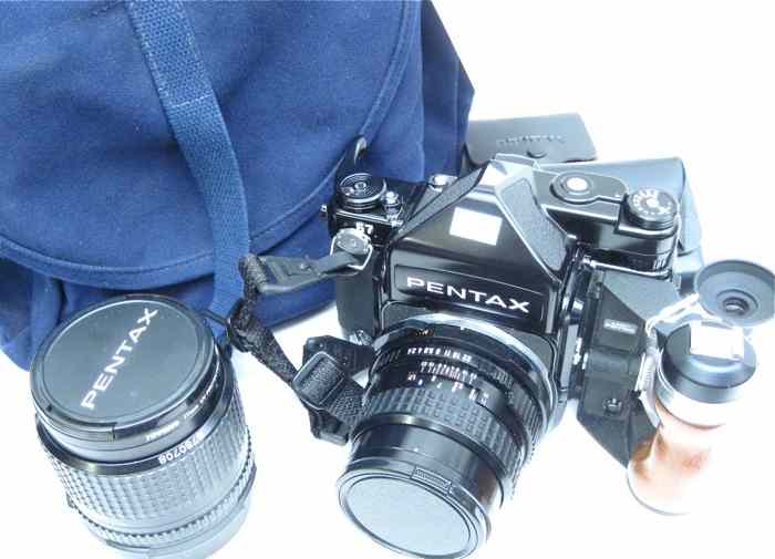 Appraisal: PENTAX SLR CAMERA AND ACCESSORIES x format takes or roll