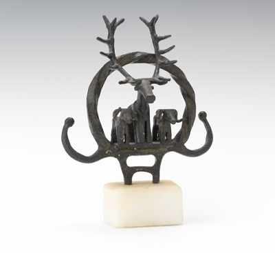 Appraisal: A Small Iron Sculpture Possibly Luristan Depicting three animals standing