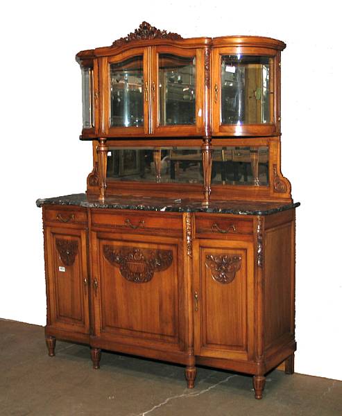 Appraisal: A French Rococo style mahogany buffet a deux corps circa