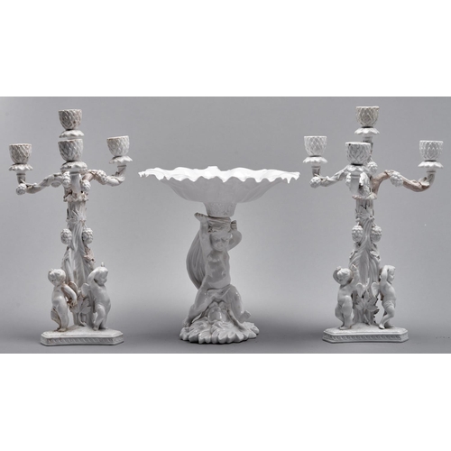 Appraisal: A pair of Copeland glazed porcelain cherub candelabra and a