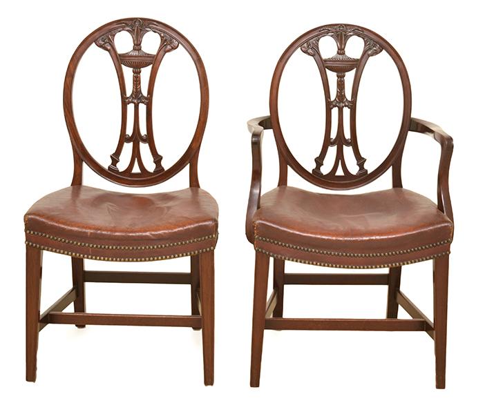 Appraisal: A SET OF EIGHT HEPPLEWHITE STYLE MAHOGANY DINING CHAIRS comprising