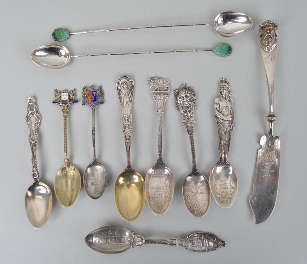 Appraisal: Group Figural Sterling Silver Accessories comprising souvenir spoons some with