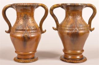 Appraisal: Pair of Stahl Redware Pottery Vases Incised and raised floral