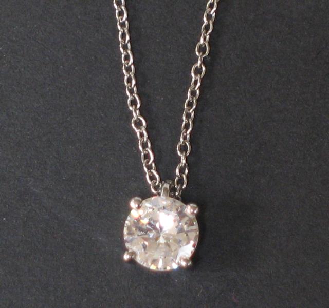 Appraisal: A DIAMOND SOLITAIRE PENDANT the brilliant-cut diamond in an ct