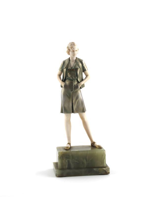 Appraisal: Gamine a bronze and ivory figure