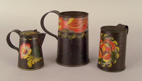 Appraisal: Two tole mugs th c h and h together with