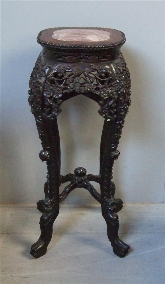 Appraisal: Chinese rosewood marble top pedestal with pierced and carved frieze