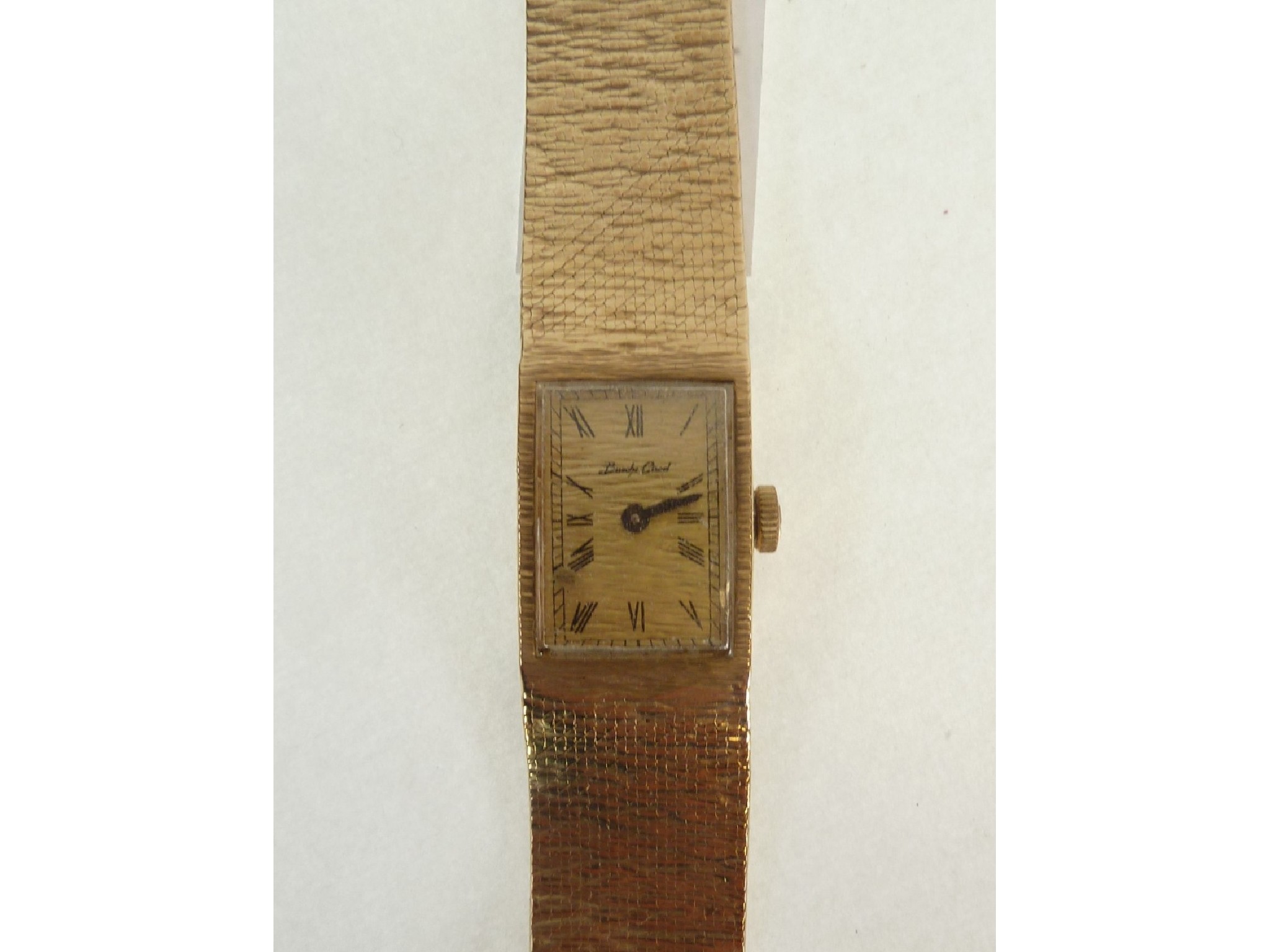 Appraisal: A LADY'S BUECHE GIROD CT GOLD BARK TEXTURED BRACELET WATCH