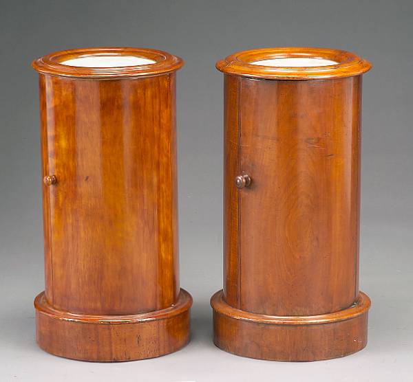 Appraisal: A near pair of William IV mahogany pedestal cupboards second