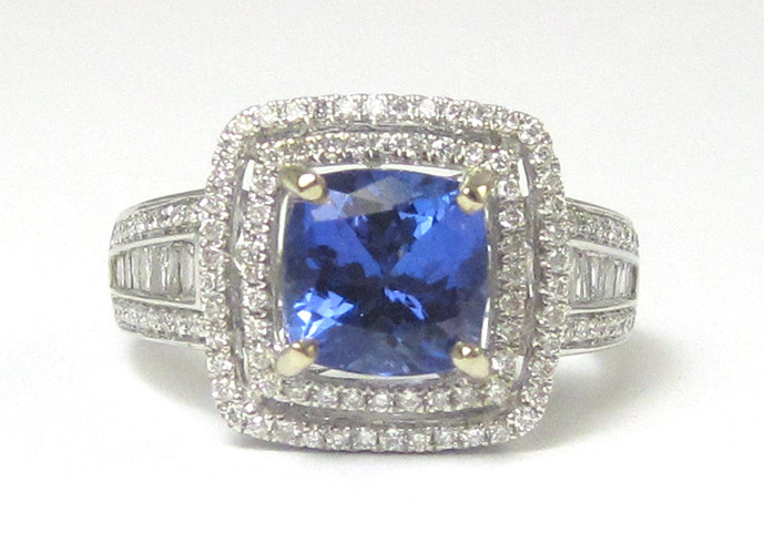 Appraisal: TANZANITE DIAMOND AND FOURTEEN KARAT WHITE GOLD RING centering a