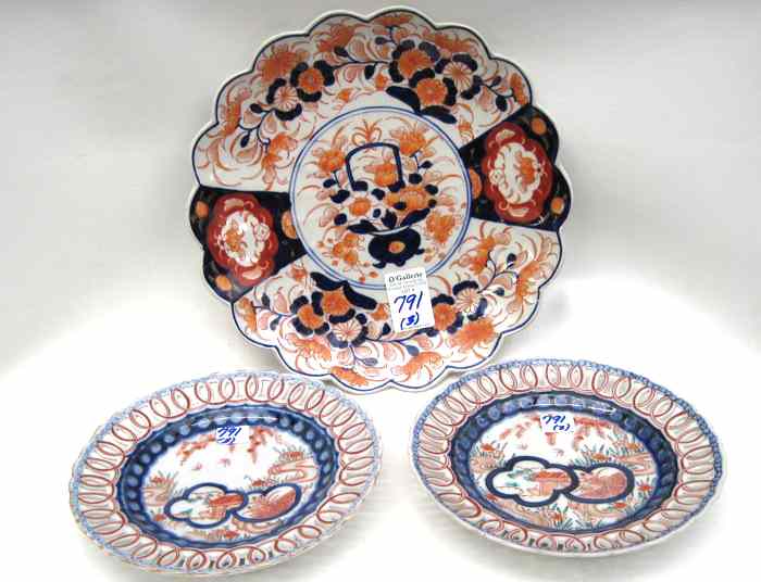 Appraisal: THREE JAPANESE IMARI PORCELAIN PIECES pair plates '' diameter having